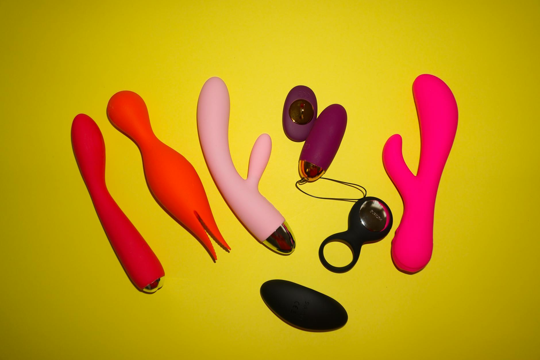 Blue silicone vibrator held in hands, representing reconnection to pleasure